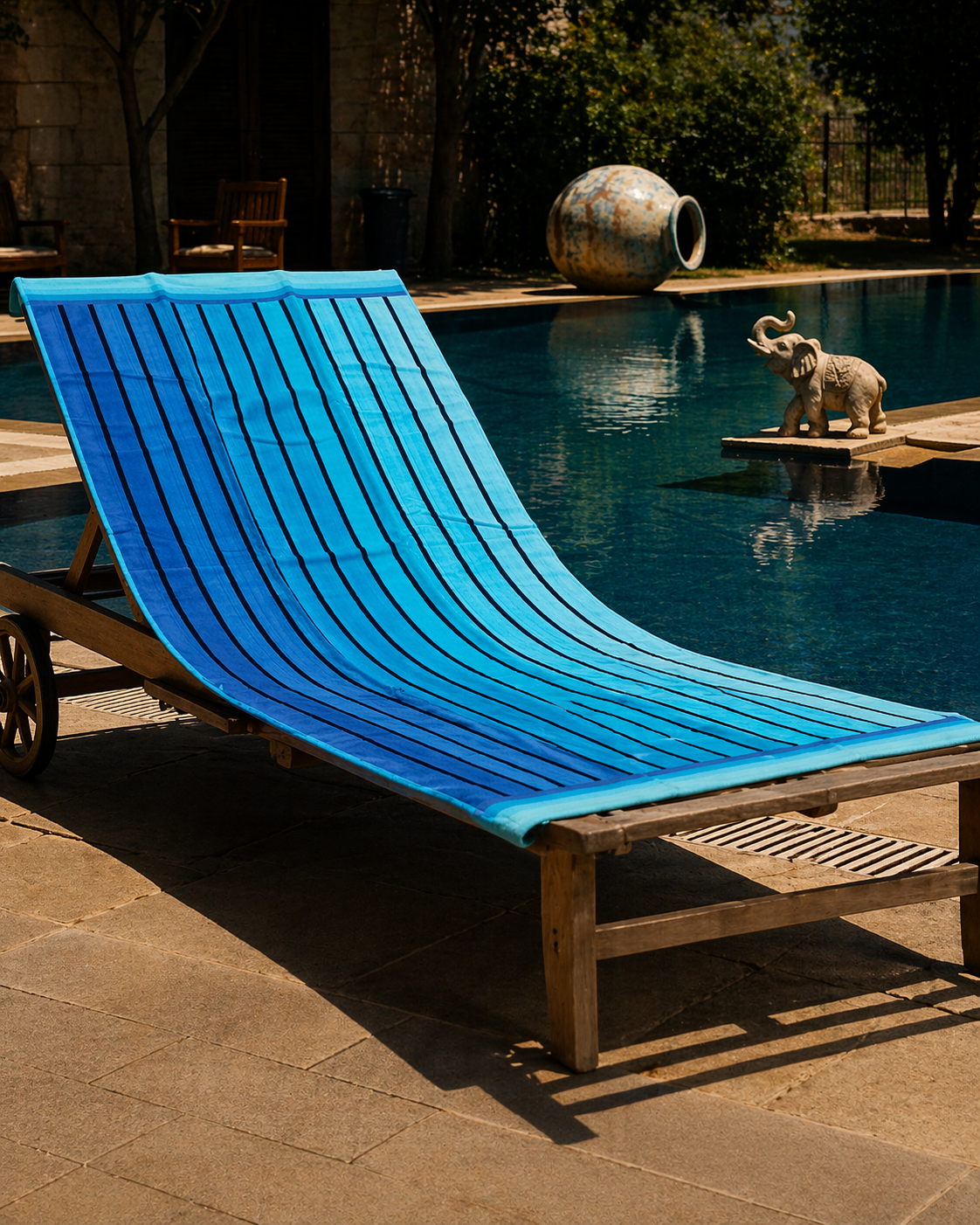 Blue and turquoise vertical pinstripe beach towel with thin black stripes