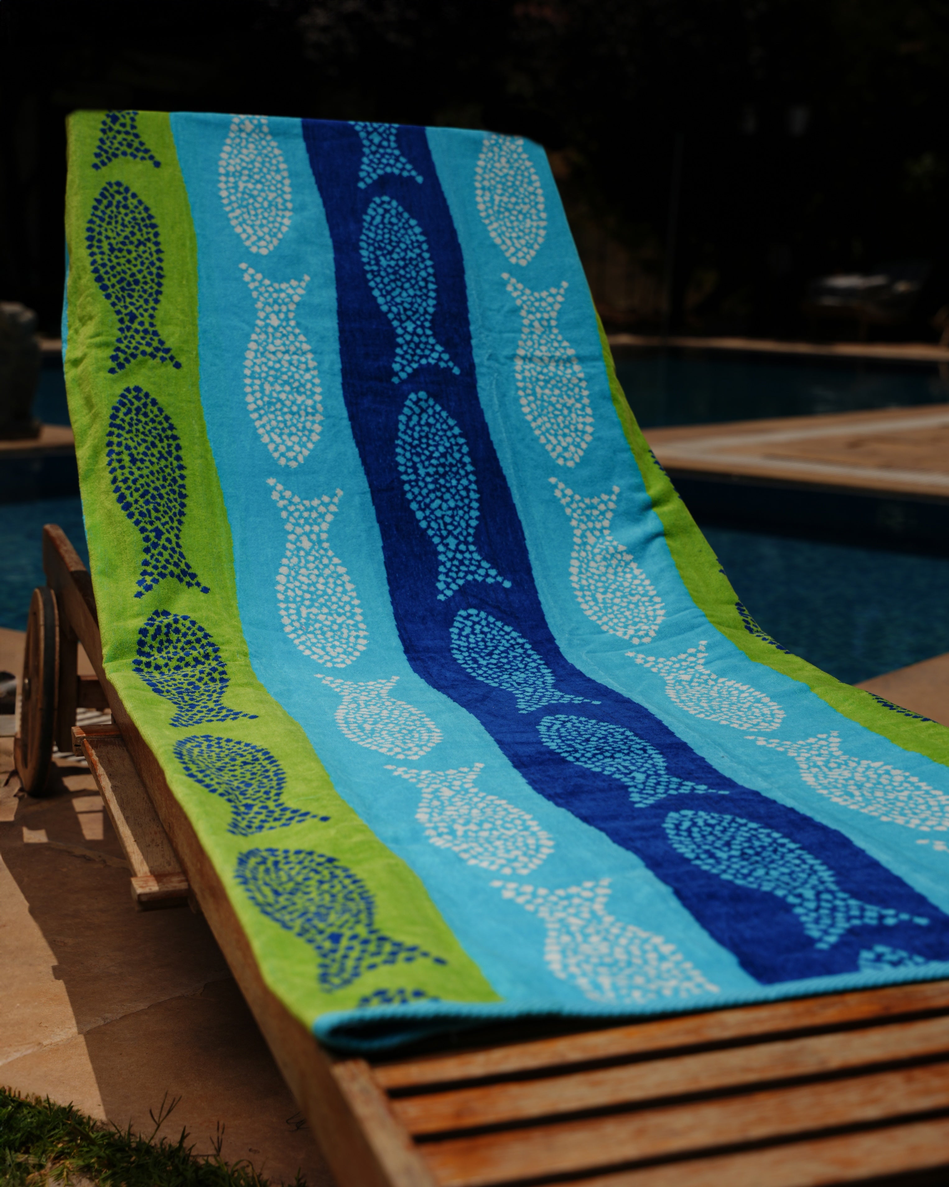 Fish In A Row Beach Towel